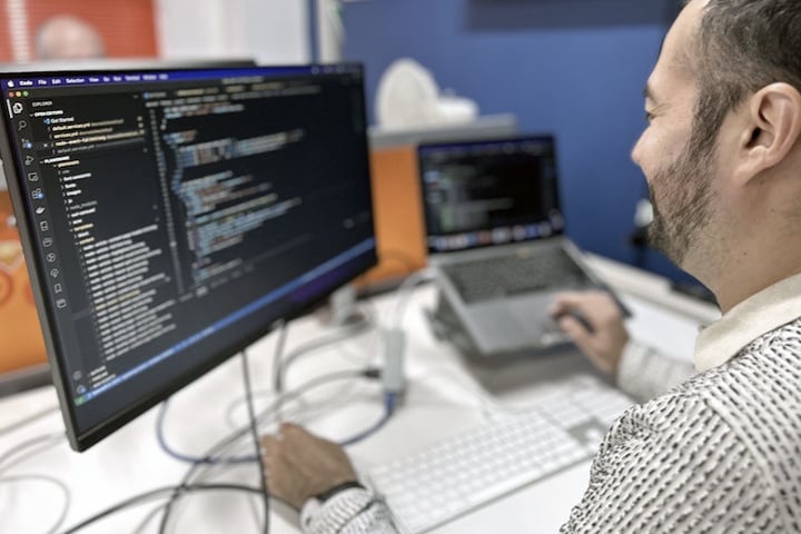 A Drupal developer coding for a website project