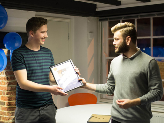 Dylan presenting Calum a Duckies 2014 Winner certificate