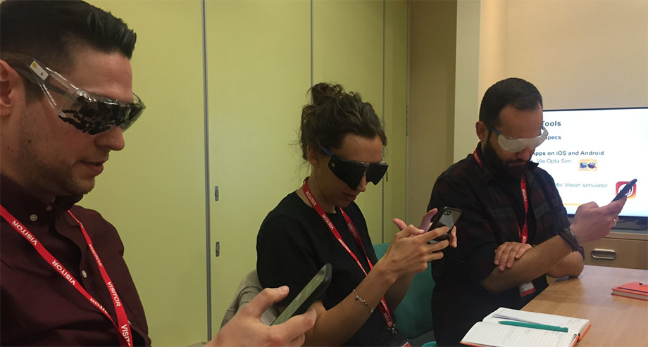 The UX team with visual impairment glasses on