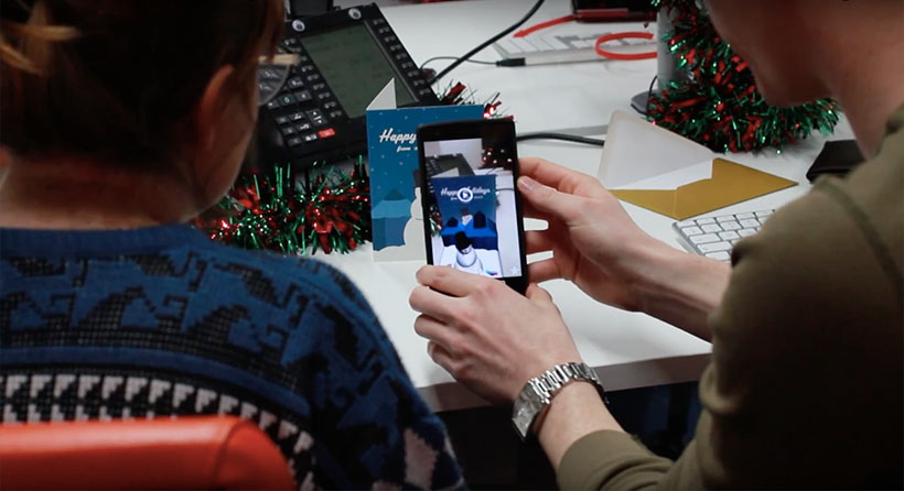 Friends react to the Augmented Reality Christmas card