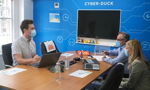 Client meeting in Cyber ducks offices with social distancing and masks